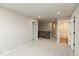 Upstairs hallway with carpet and doors to various rooms including a bathroom at 1019 Cyprian Way, Lebanon, IN 46052