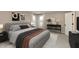 Relaxing main bedroom with soft gray tones, modern decor, and ample natural light creating a serene retreat at 1019 Cyprian Way, Lebanon, IN 46052