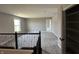 Loft with carpeted floors, a window for natural light, and access to a closet at 12023 Crestwater Ct, Fishers, IN 46037