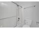 Bathroom highlighting a shower-tub combo with modern fixtures at 12997 Bartlett Dr, Fishers, IN 46037
