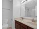 Bathroom featuring a walk-in shower and a vanity with double sinks at 12997 Bartlett Dr, Fishers, IN 46037