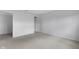 This bedroom has neutral colored walls and carpeting, and a view into the hallway at 12997 Bartlett Dr, Fishers, IN 46037