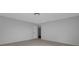 Bedroom with neutral walls and carpet, along with a doorway leading to another room at 12997 Bartlett Dr, Fishers, IN 46037