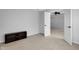 Bedroom showcasing plush carpet, a base cabinet, and an open doorway leading to another room at 12997 Bartlett Dr, Fishers, IN 46037