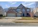 Charming two-story home with brick and siding, a two-car garage, and a well-maintained front yard at 12997 Bartlett Dr, Fishers, IN 46037