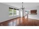 Bright living space with hardwood floors, multiple windows, and an open concept at 12997 Bartlett Dr, Fishers, IN 46037