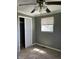 Relax in the spacious bedroom featuring a ceiling fan, window, closet, and plush carpeting at 2270 Wheeler St, Indianapolis, IN 46218
