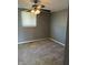 Cozy bedroom featuring carpeting, neutral walls, and a bright window, creating a comfortable personal space at 2270 Wheeler St, Indianapolis, IN 46218