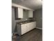 Functional kitchen with ample cabinet space, practical countertops, and essential sink, designed for everyday cooking at 2270 Wheeler St, Indianapolis, IN 46218