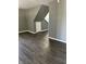 Spacious living room with modern flooring, neutral paint, and ample natural light creating a welcoming atmosphere at 2270 Wheeler St, Indianapolis, IN 46218