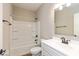 Well-lit bathroom features tub/shower combo, modern fixtures, and a classic white sink at 7370 Broadview Ln, McCordsville, IN 46055