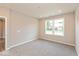 Comfortable bedroom features a large window and neutral carpet at 7370 Broadview Ln, McCordsville, IN 46055