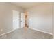 Neutral bedroom features carpet and two doors, creating a peaceful, private retreat at 7370 Broadview Ln, McCordsville, IN 46055
