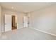 Large bedroom includes neutral carpet and two doors at 7370 Broadview Ln, McCordsville, IN 46055