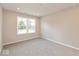 Cozy bedroom with a large window and neutral carpet at 7370 Broadview Ln, McCordsville, IN 46055
