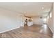 Spacious living room has an open layout with wood floors and recessed lighting at 7370 Broadview Ln, McCordsville, IN 46055