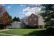 Charming two-story home with a two-car garage, manicured lawn, and a mix of brick and vinyl siding at 9563 England Ct, Noblesville, IN 46060