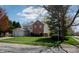 Attractive home with a two-car garage, inviting curb appeal, and a well-kept front yard at 9563 England Ct, Noblesville, IN 46060