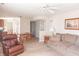 Open concept living area with comfortable seating, adjacent dining space, and seamless flow throughout at 9563 England Ct, Noblesville, IN 46060
