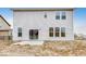 Back of the house with sliding doors, a patio, and a large yard at 1145 Bevy Blvd, Danville, IN 46122