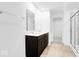 Bathroom featuring double vanity, walk-in shower, and tile floor at 1145 Bevy Blvd, Danville, IN 46122
