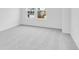 Bright bedroom features neutral carpet, white walls, and a window offering natural light at 1145 Bevy Blvd, Danville, IN 46122