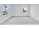 Bedroom featuring carpet floor and view of the neighborhood through the window at 1145 Bevy Blvd, Danville, IN 46122