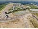 Aerial view of a new construction community with single-Gathering homes and ponds at 1567 Hanover St, Danville, IN 46122