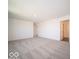 Spacious bedroom featuring neutral carpet and white walls, ready for personalization at 1567 Hanover St, Danville, IN 46122