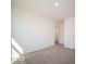Bright bedroom with carpet flooring, closet, and entry door to the hallway at 1567 Hanover St, Danville, IN 46122