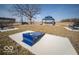 Outdoor area with seating and cornhole game perfect for relaxation and socializing at 1567 Hanover St, Danville, IN 46122