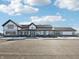 Attractive community building featuring a modern farmhouse design with white siding and black trim at 1567 Hanover St, Danville, IN 46122