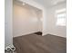 Open foyer area featuring durable hardwood floors, a window, and a bright white front door at 1567 Hanover St, Danville, IN 46122