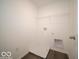 Functional laundry room area with sleek flooring and space for appliances at 1567 Hanover St, Danville, IN 46122