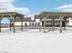 Covered outdoor patio featuring a well-designed pergola, perfect for relaxation and entertaining at 1567 Hanover St, Danville, IN 46122