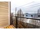 Balcony with glass railings providing unobstructed views of the cityscape at 233 E Saint Joseph St # 3E, Indianapolis, IN 46202