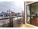 Private balcony offers a relaxing outdoor space with a view of the neighborhood at 233 E Saint Joseph St # 3E, Indianapolis, IN 46202