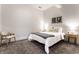 Cozy bedroom features carpeted floors, a comfortable bed, and stylish nightstands at 233 E Saint Joseph St # 3E, Indianapolis, IN 46202
