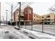 Modern apartment building with mixed siding, private balconies and gated parking at 233 E Saint Joseph St # 3E, Indianapolis, IN 46202