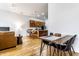 Open concept living space with a kitchen, living room and dining area at 233 E Saint Joseph St # 3E, Indianapolis, IN 46202