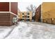 Apartment building with rear parking and exterior view of balconies at 233 E Saint Joseph St # 3E, Indianapolis, IN 46202