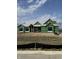 New construction home showcasing modern design with ZIP System sheathing and a partially completed roof at 2974 S Kings Way, New Palestine, IN 46163