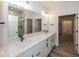 Modern bathroom featuring double sink vanity with white countertops, stylish fixtures, and ample storage space at 3917 Holly Brook Dr, Westfield, IN 46062
