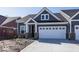 Charming home featuring a two-car garage, stylish gray siding, and a welcoming front porch at 3917 Holly Brook Dr, Westfield, IN 46062