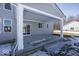 Covered back patio with concrete flooring and white columns at 4958 Reavie Ct, Noblesville, IN 46062