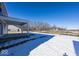 Snow-covered backyard with a view of trees and neighboring homes at 4958 Reavie Ct, Noblesville, IN 46062