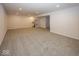 Spacious unfinished basement with neutral carpeting and ample storage at 4958 Reavie Ct, Noblesville, IN 46062