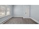 Well-lit bedroom featuring neutral walls, carpet, and a closet at 620 S 18Th St, Elwood, IN 46036