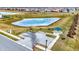 Aerial view of the neighborhood pond and picnic area at 7062 English Oak Dr, McCordsville, IN 46055