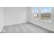Well-lit bedroom with large windows and neutral walls over gray carpet at 16043 Meadow Frost Ct, Fishers, IN 46037